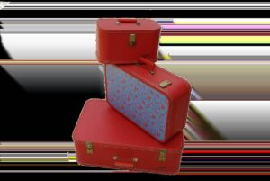 Trois valises empilées, une grande, une moyenne, une petite